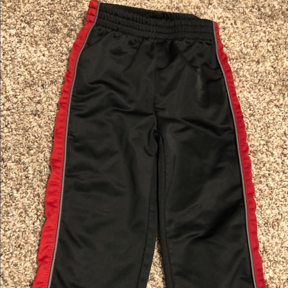 Puma sweat pants black with red stripe